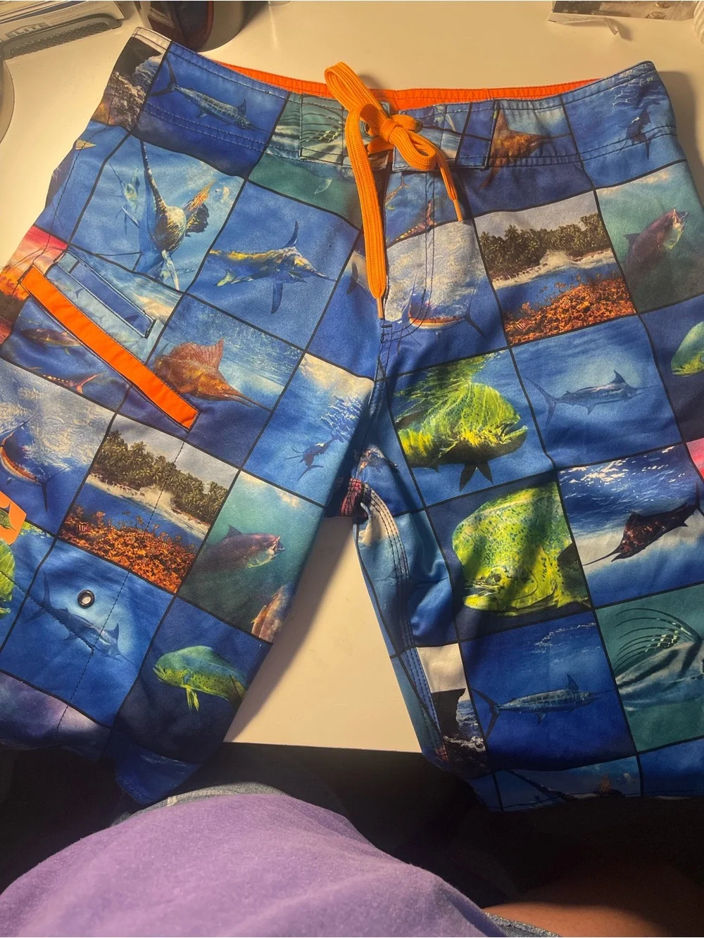 Pelagic Blue Ocean Photo-Block Swim Shorts with Orange Accents